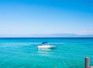 Boating on Lake Tahoe in summer sunshine